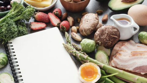 Food next to a notebook